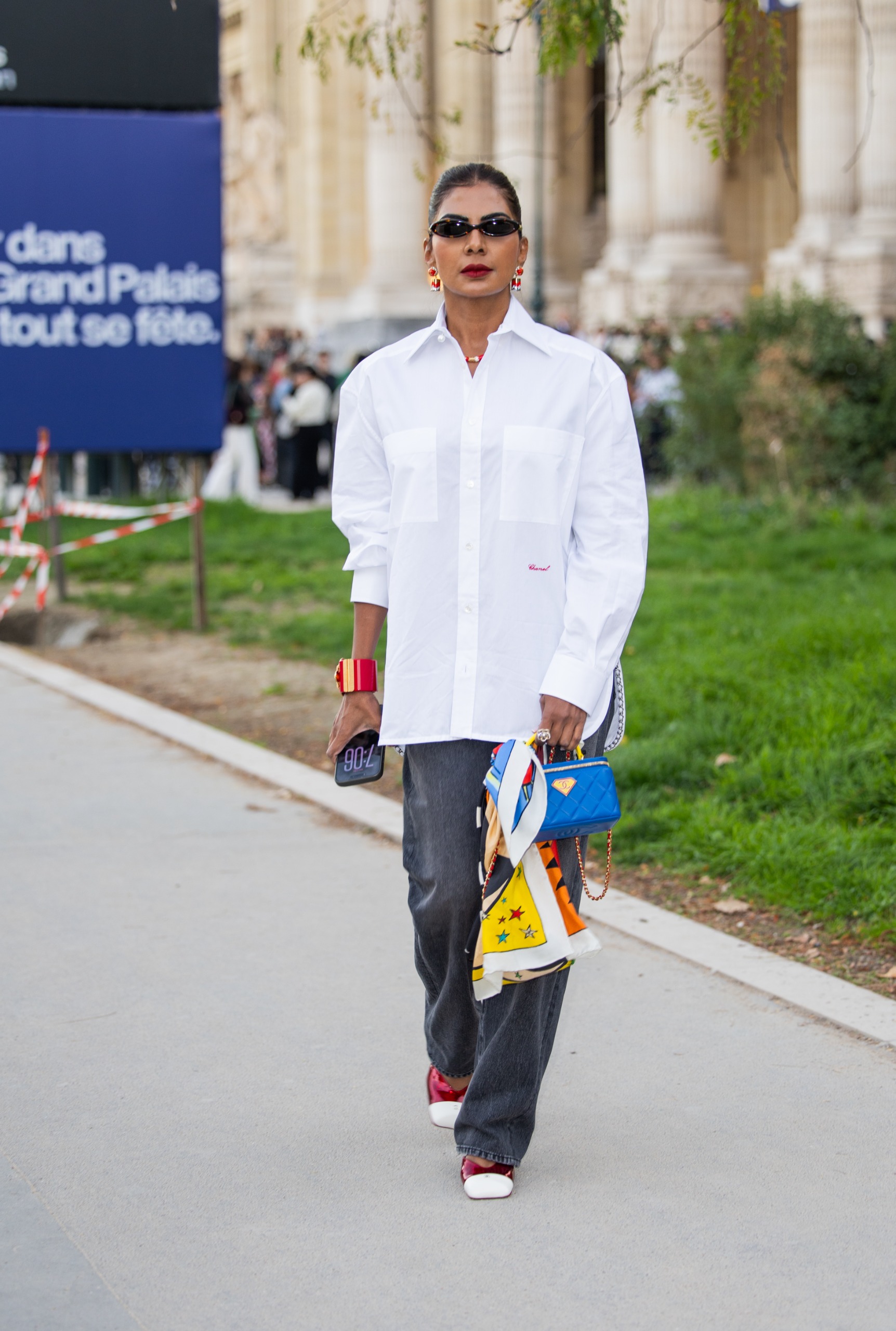 Photo of a Paris Fashion Week guest wearing French girl denim and jeans trends