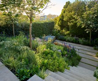 paved tiered garden by Surfacedesign