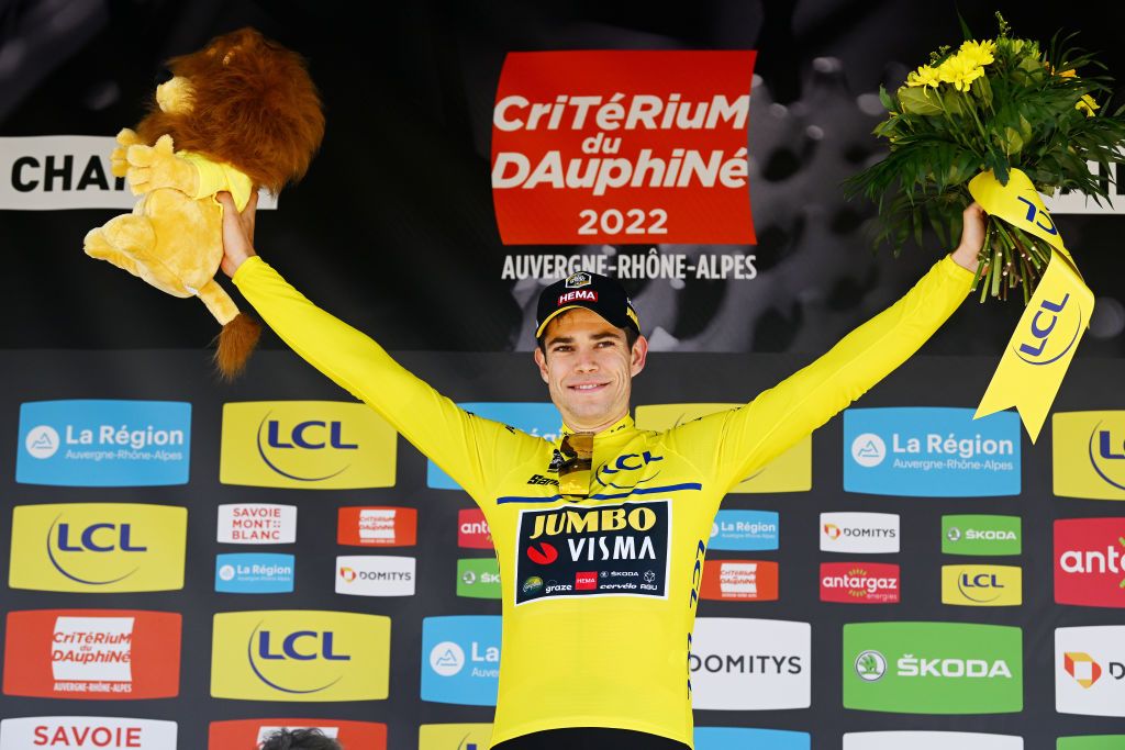 CHAINTRE FRANCE JUNE 09 Wout Van Aert of Belgium and Team Jumbo Visma celebrates winning the Yellow Leader Jersey on the podium ceremony after the 74th Criterium du Dauphine 2022 Stage 5 a 1623km stage from ThizylesBourgs to Chaintr WorldTour Dauphin on June 09 2022 in Chaintre France Photo by Dario BelingheriGetty Images