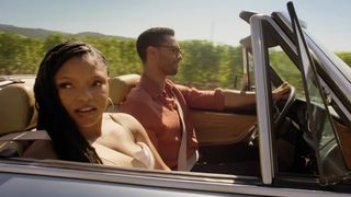 Halle Bailey and Rege-Jean Page are shown driving in You, Me & Tuscany.