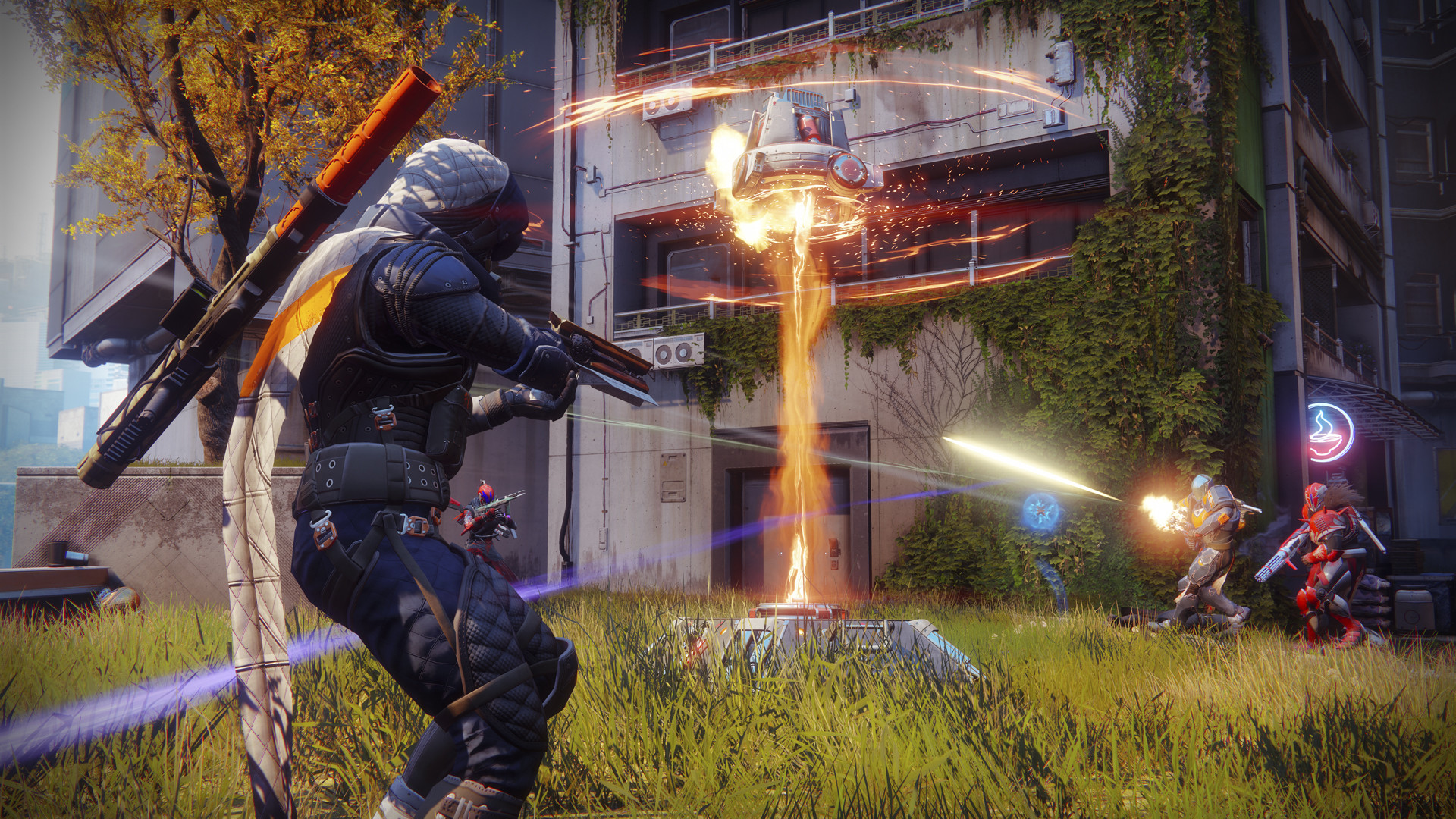 Destiny 2 players battle over an objective in a futuristic urban arena, with gunfire, abilities, and explosions lighting up an intense multiplayer firefight.