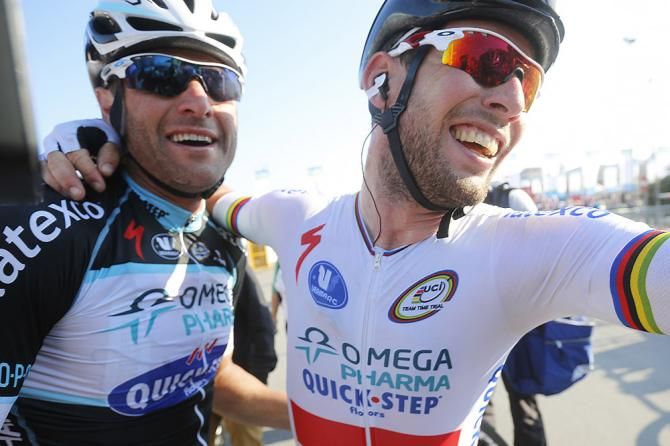 Stage 6 winner Mark Cavendish celebrates his victory with teammate Alessandro Petacchi, who placed second on the day