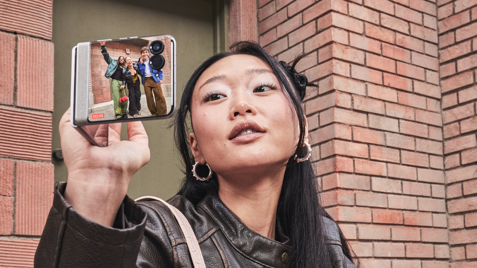 Motorola Razr 2026 held in the hand.