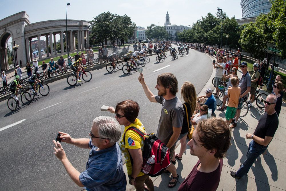 Fans watch as the race completes laps through downtown