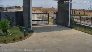 Screen-capture of a home security camera facing a front porch during an earthquake.
