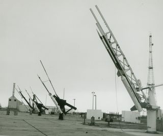 NASA launched 32 sounding rockets, some of them seen on rail launchers here, from the Wallops Flight Facility on Wallops Island, Virginia to study the total solar eclipse of March 7, 1970.
