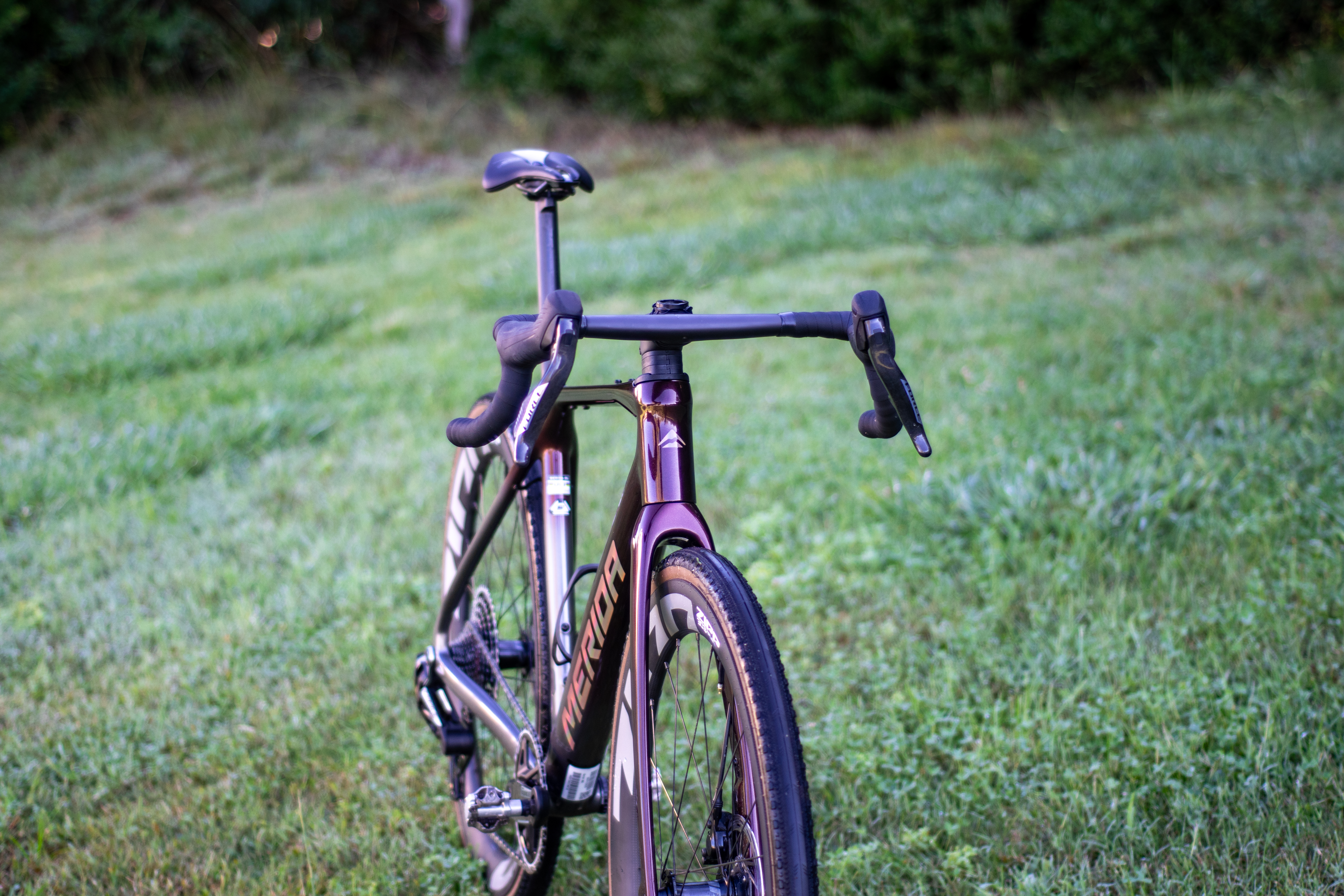A Merida Mission gravel bike on some grass