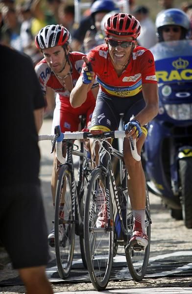 An ecstatic Alberto Contador (Saxo Bank-Tinkoff Bank) knows the 2012 Vuelta is his atop the Bola del Mundo summit finish.