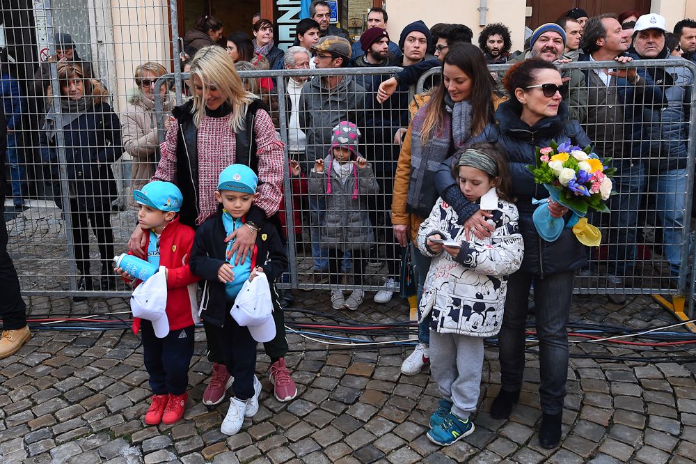 Anna Scarponi and son wait for the podium ceremony after stage 5 at Tirreno-Adriatico
