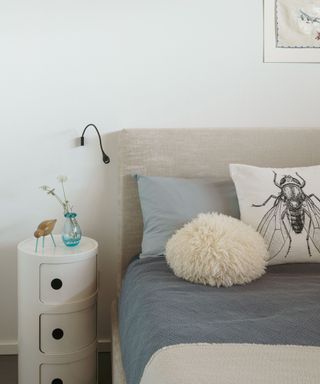 Bedroom with blue cushion and insect cushion