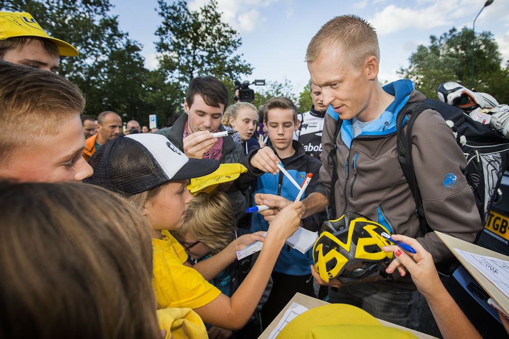 Robert Gesink signs autographs during 'Daags na de Tour,' in Boxmeer, the Netherlands, on July 27.