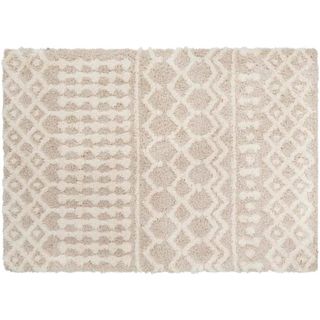 A cream textured area rug with global-inspired pattern