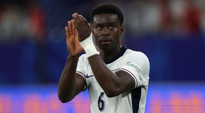 England defender Marc Guehi applauds the fans after victory over Serbia at Euro 2024.