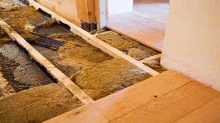 Insulating suspended floors