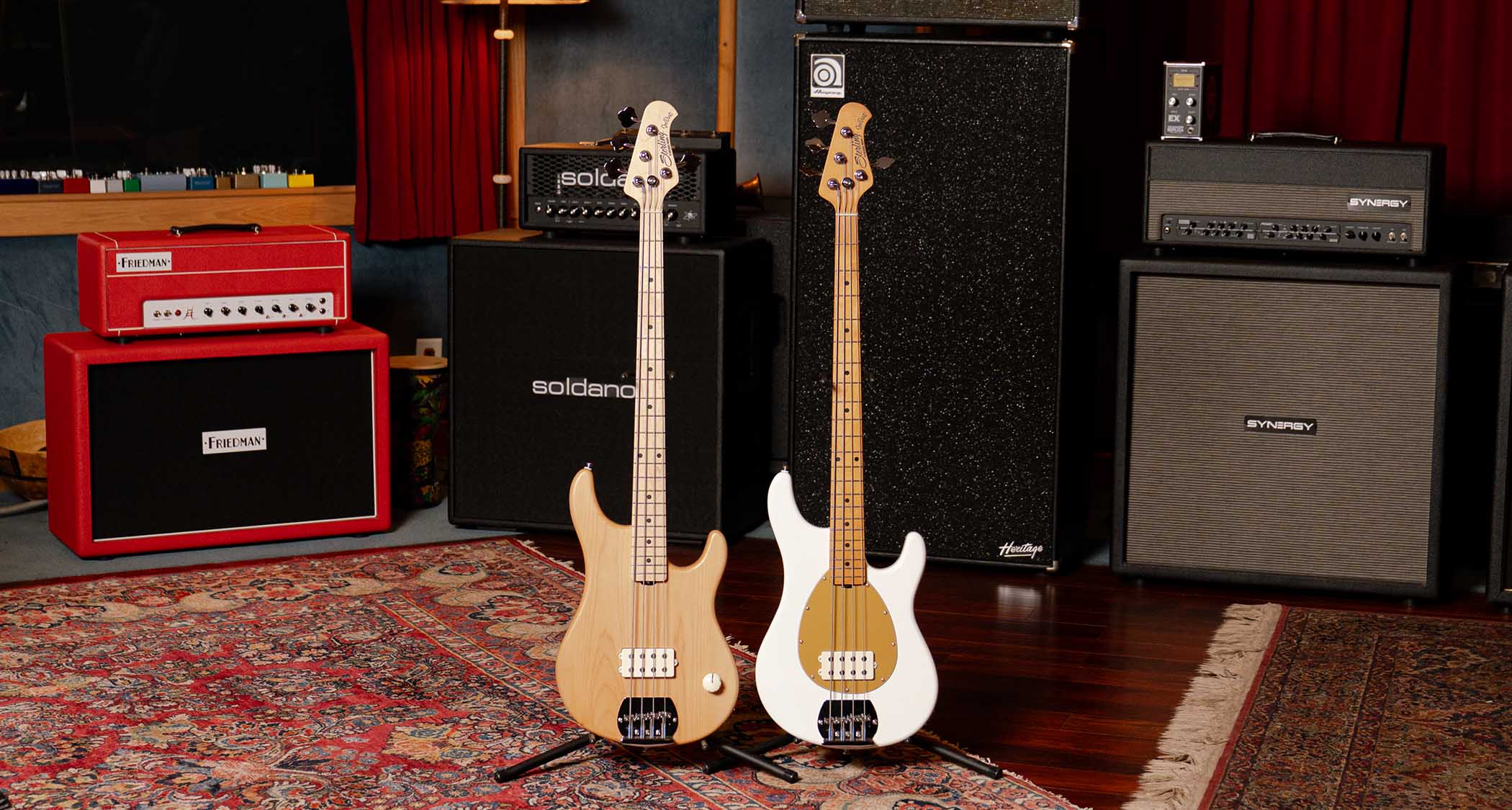 Sterling By Music Man Joe Dart Collection, ft. the Joe Dart I [left] and the Joe Dart Vision &ndash; the bass with no controls