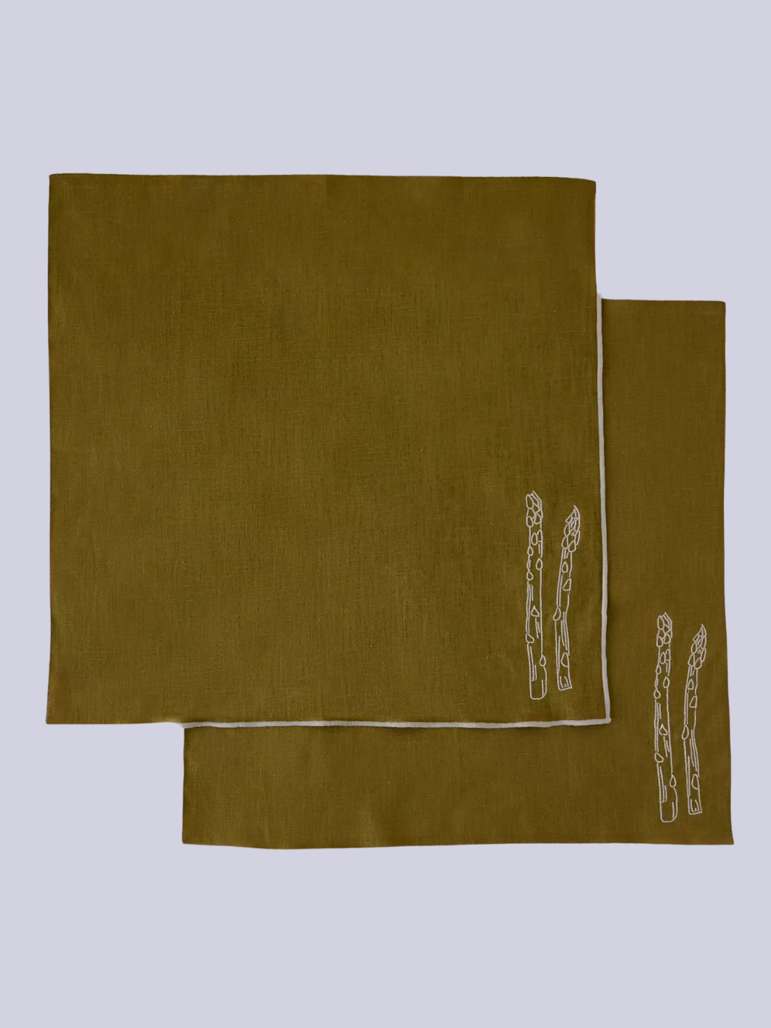 A set of two green napkins with embroidered asparagus
