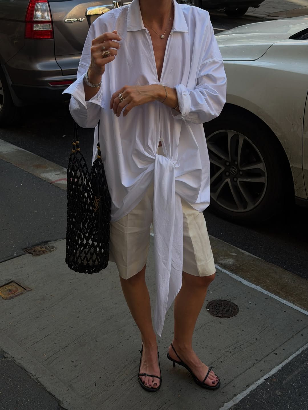 @hannahlewisstylist wears St. Agni heeled sandals.