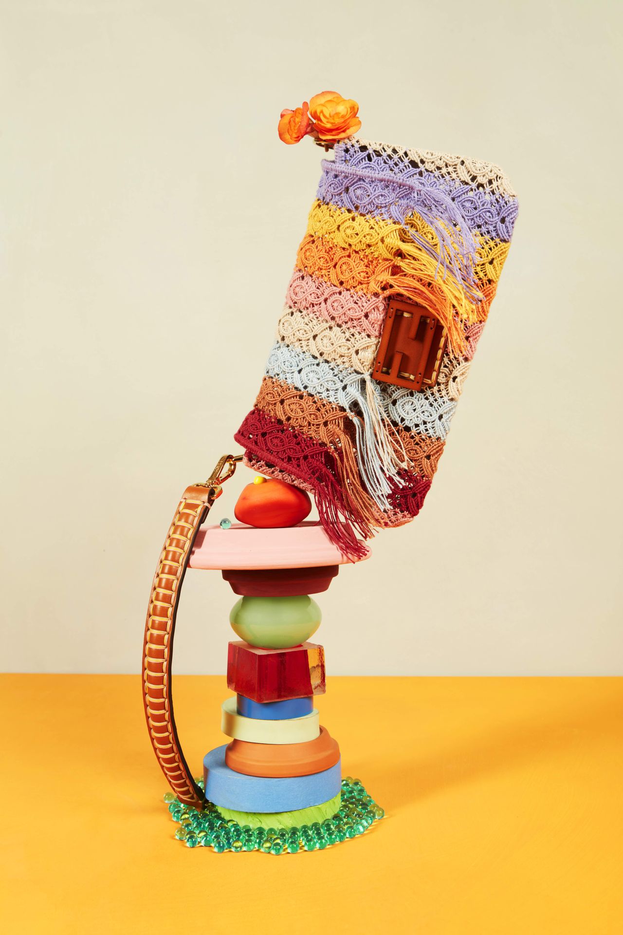 Colourful crotchet Fendi Baguette handbag balances on coloured discs