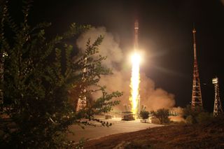 A Russian-built Arianespace Soyuz rocket launches 34 OneWeb internet satellites into space from Baikonur Cosmodrome, Kazakhstan on Aug. 21, 2021 (Aug. 22 local Baikonur time).
