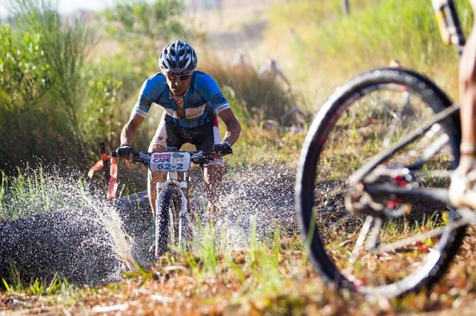 Abraao Azevedo makes his way over a water crossing