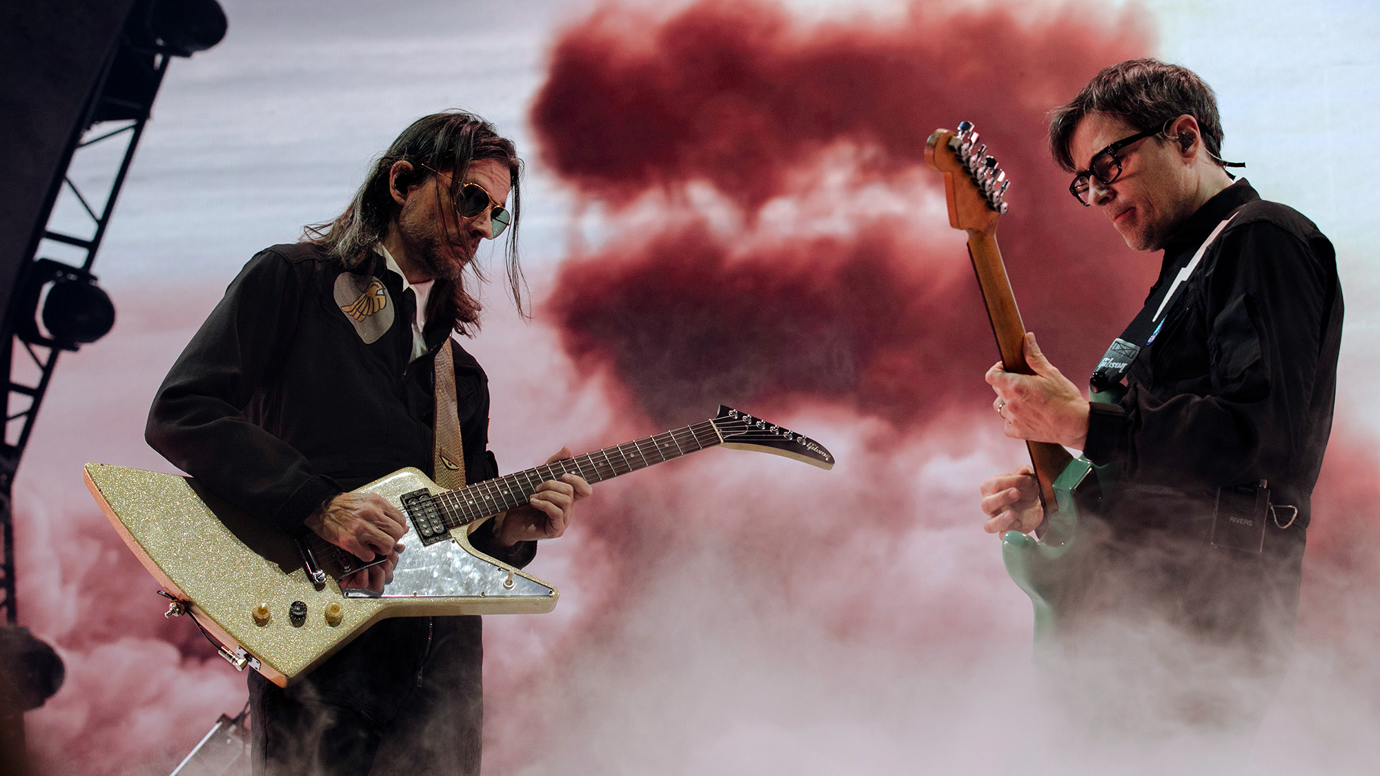 Brian Bell and Rivers Cuomo of Weezer perform during the Voyage To The Blue Planet Tour at Bridgestone Arena on September 17, 2024 in Nashville, Tennessee.