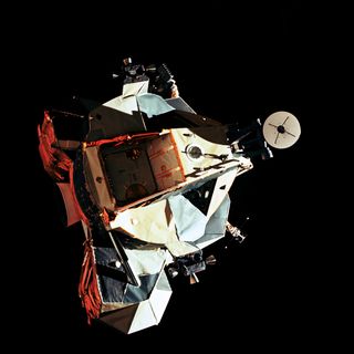 Lunar Module for the Apollo 17 mission, named "Challenger" with a large white antenna/dish on the right.