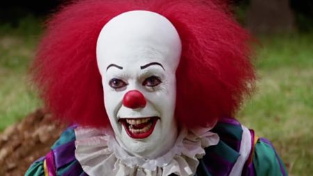 Tim Curry as Pennywise in It (1990)