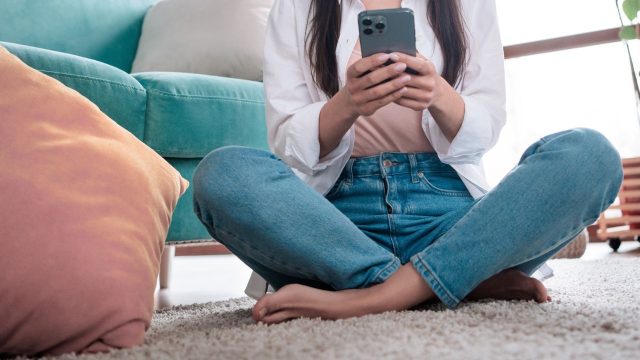 Woman holding iPhone