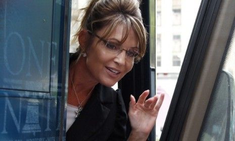 Sarah Palin boards her &amp;quot;One Nation&amp;quot; bus