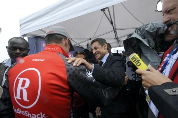French president Nicolas Sarkozy greets Lance Armstrong in 2010