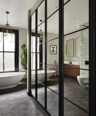 A large bathroom with mirrored storage cabinet