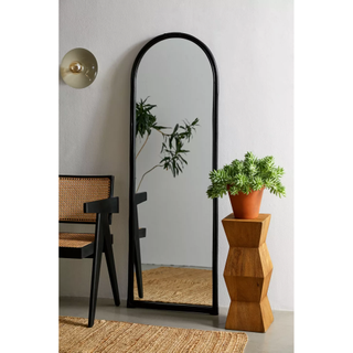 black arched floor mirror