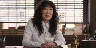 The Chair Sandra Oh Ji-Yoon Kim talks to someone in her office.