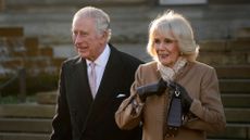 King Charles III and Camilla, Queen Consort leave Bolton Town Hall during a tour of Greater Manchester on January 20, 2023 in Bolton, United Kingdom. 