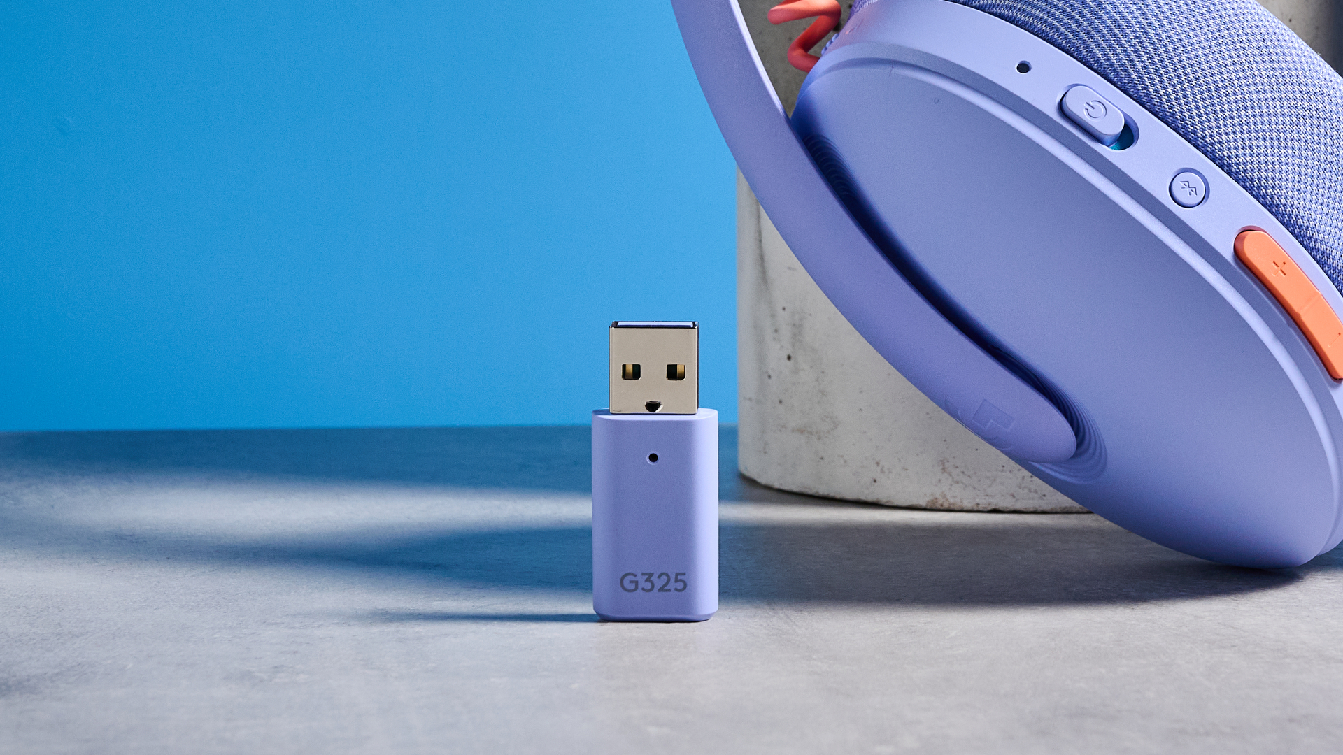 A lilac Logitech G325 Lightspeed wireless gaming headset