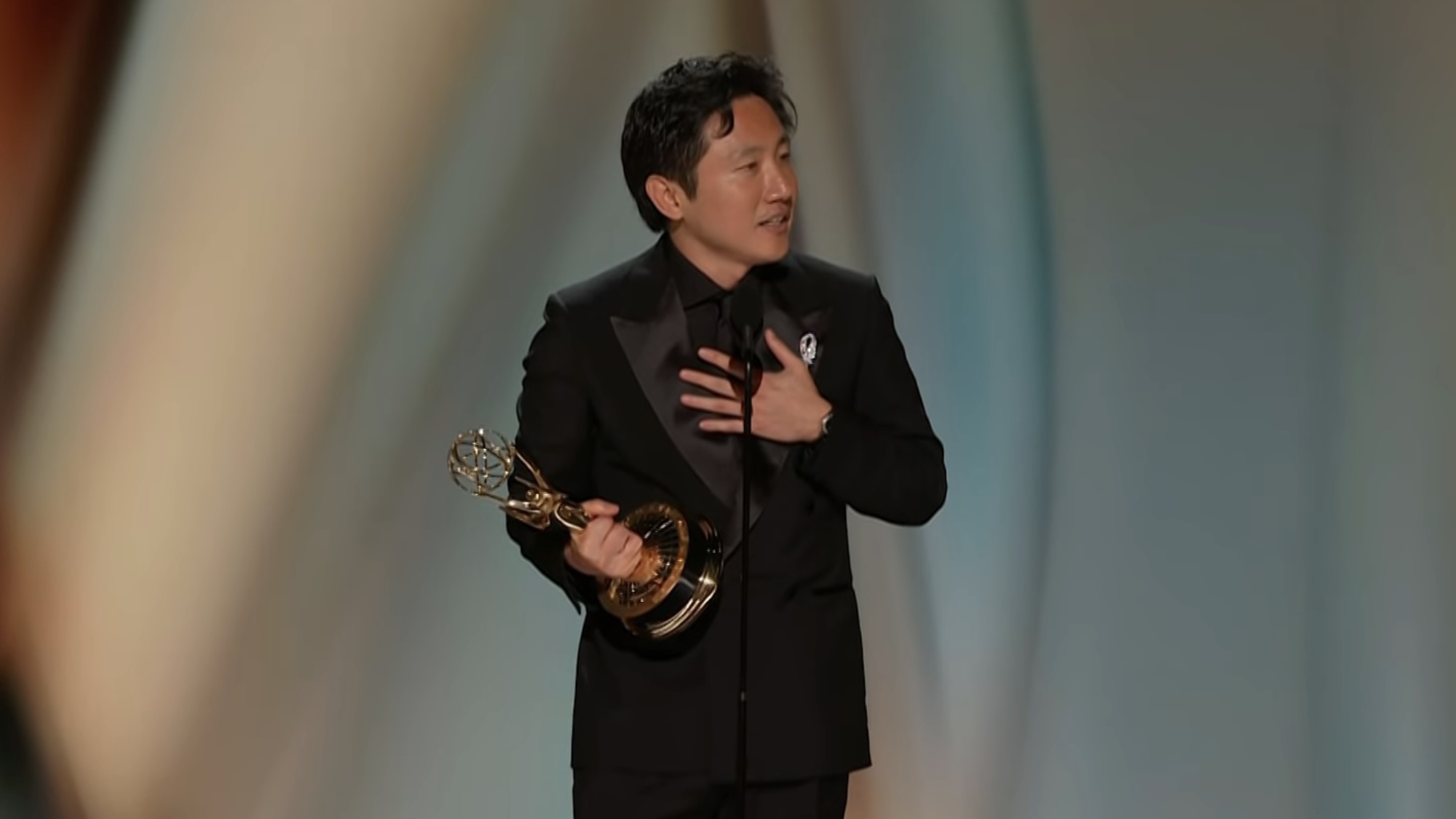 Hiro Murai accepting award for Widow's Bay at 2026 Emmys
