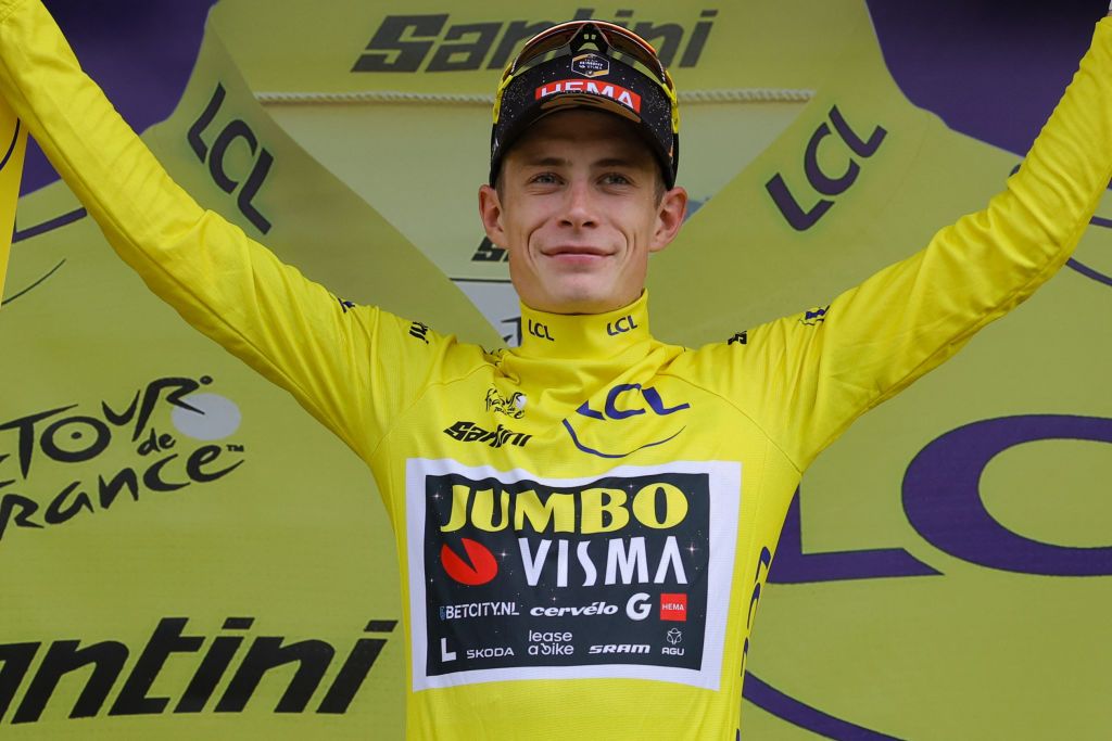 JumboVismas Danish rider Jonas Vingegaard celebrates on the podium with the overall leaders yellow jersey after the 8th stage of the 110th edition of the Tour de France cycling race 201 km between Libourne and Limoges in central western France on July 8 2023 Photo by Thomas SAMSON AFP Photo by THOMAS SAMSONAFP via Getty Images