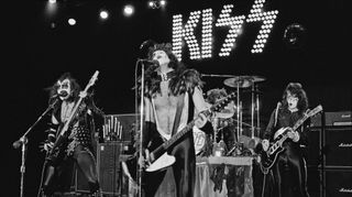 (from left to right) Kiss's Gene Simmons, Paul Stanley, Peter Criss and Ace Frehley perform onstage at the Cobo Hall in Detroit, Michigan on May 16, 1975