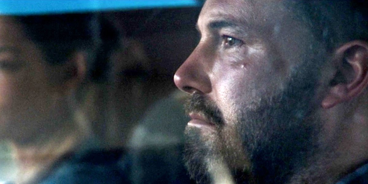 Jack Cunningham (Ben Affleck) looks somber through a car window in The Way Back