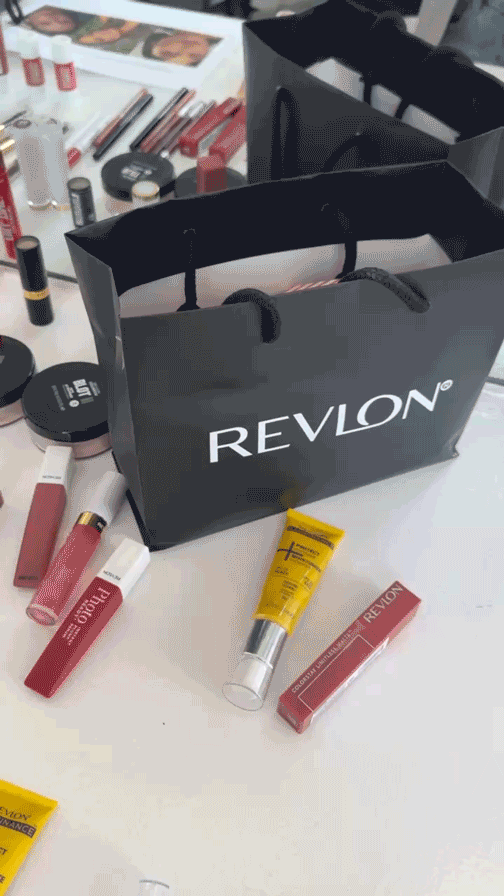 a video of revlon products on a white table