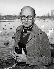 Sir Peter Scott photographed in 1972, sitting in the observation window at his house at the Wildfowl and Wetlands Trust, Slimbridge, UK. Credit: Christopher Jones/Alamy