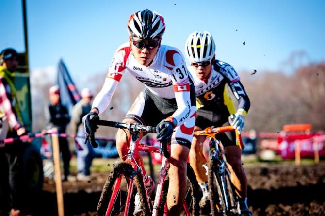 Toki Sawada (Team Bridgestone Anchor) chases in a muddy section