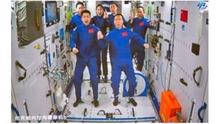 The six astronauts of China's Shenzhou 14 and Shenzhou 15 missions to the Tiangong space station pose for a crew photo in orbit in November 2022.