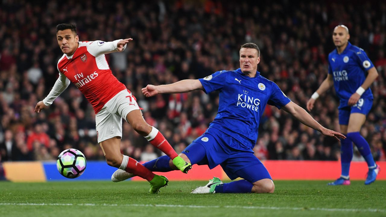 Alexis Sanchez and Robert Huth