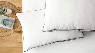 Best pillows: Two Saatva Latex Pillows placed on a white mattress