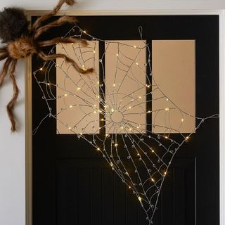 Front porch with halloween spider web