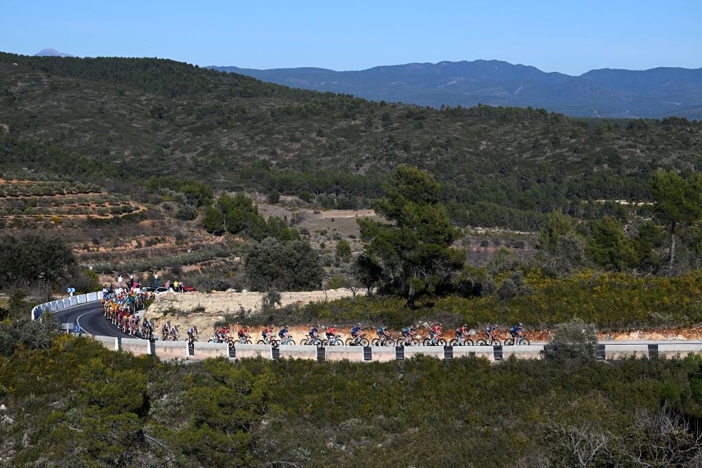 ALTURA SPAIN FEBRUARY 04 Alex Aranburu of Spain and Movistar Team Orange Points Jersey and a general view of the peloton competing during the 74th Volta a la Comunitat Valenciana 2023 Stage 4 a 1816km stage from Burriana to Alto de la Cueva Santa Altura 832m VCV2023 VoltaValenciana on February 04 2023 in Altura Spain Photo by Dario BelingheriGetty Images