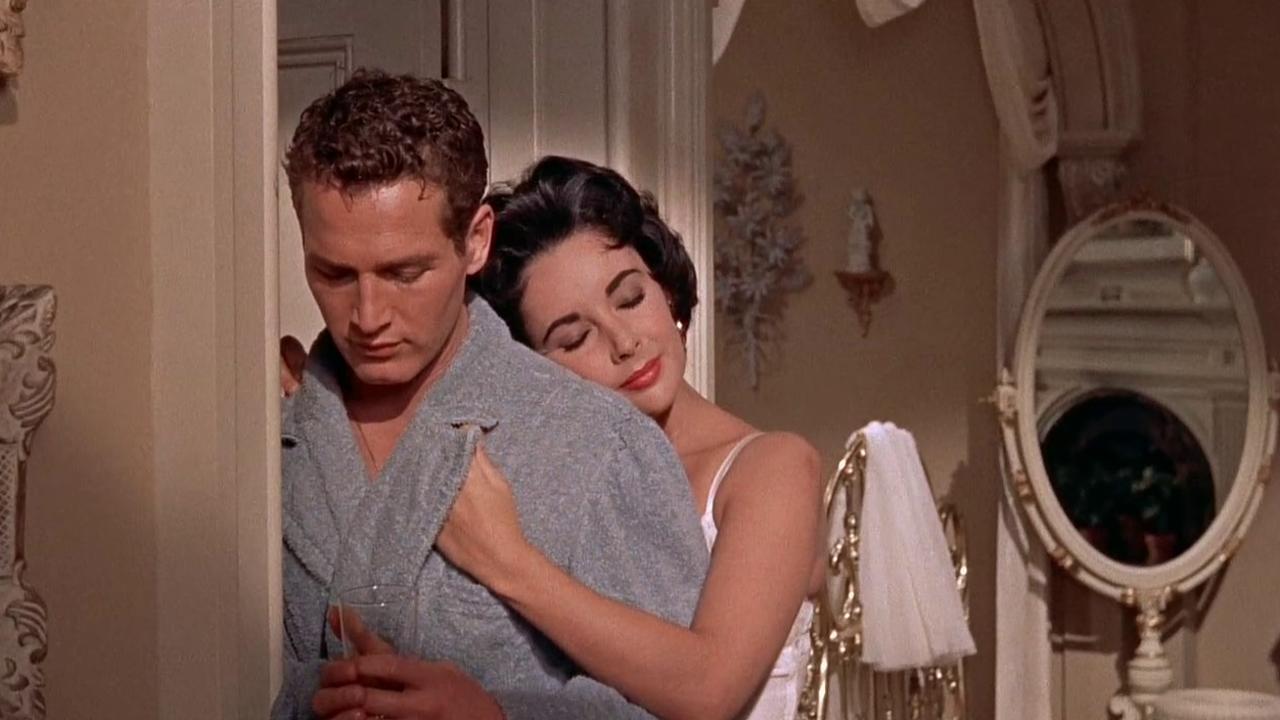 Paul Newman as Brick and Elizabeth Taylor (as Maggie) in 