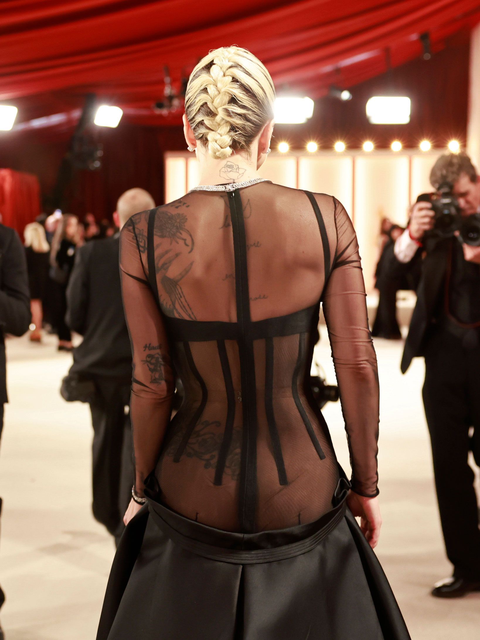 Lady Gaga wears a sheer black dress to the Oscars in 2023