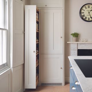 Cream shaker kitchen with pull-out larder storage